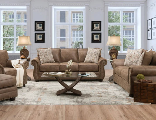 Brown sofa set in a living room with wooden coffee table and decorative items.
