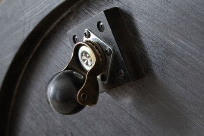 Dyonton - Round Cocktail Table - Light Grayish Brown