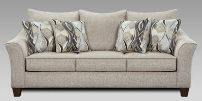 Beige sofa with patterned cushions on a gray background