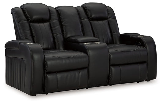 Caveman Den - Power Reclining Loveseat with Console/ Adj Hdrst - Midnight