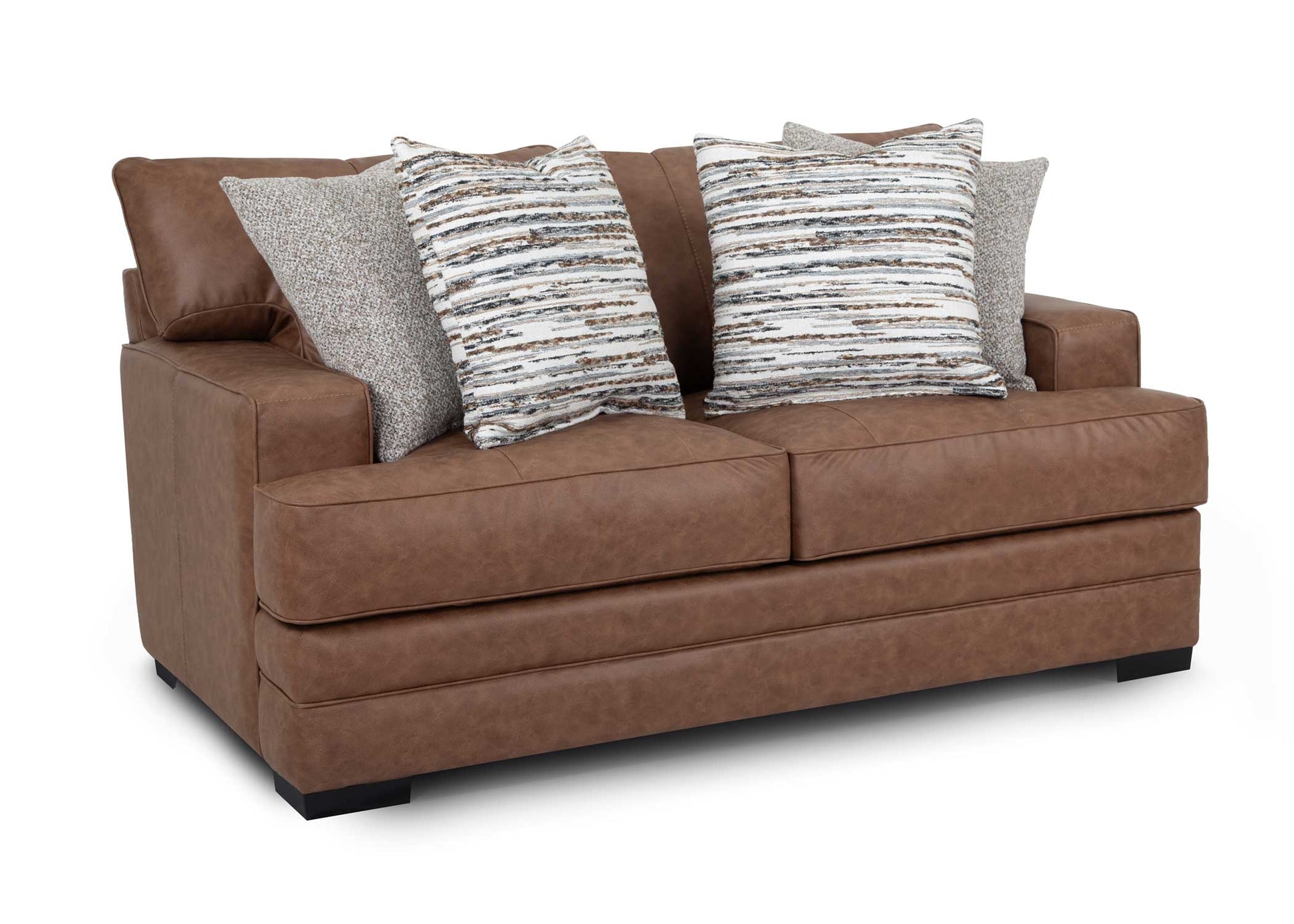 Brown sofa with patterned cushions on a white background angled