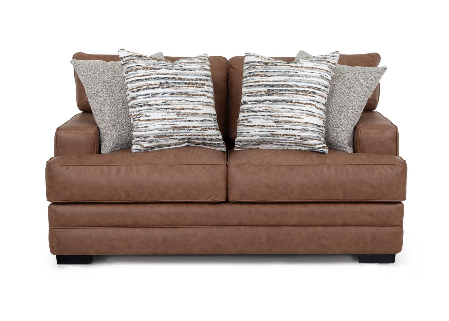 Brown sofa with patterned cushions on a white background