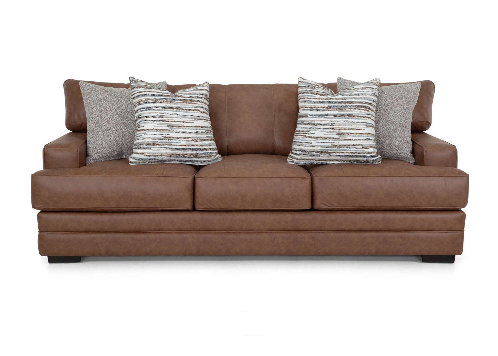 Brown leather sofa with patterned cushions on a white background Front