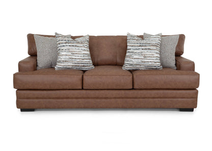 Brown leather sofa with patterned cushions on a white background Front
