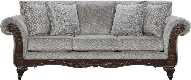 Gray sofa with decorative pillows on a white background