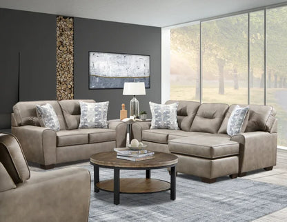Living room with beige sectional sofa, coffee table, and decorative pillows.