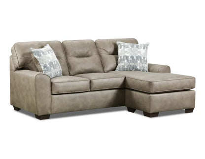 Beige sectional sofa with patterned cushions on a white background